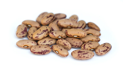 Pinto beans on white background. Close-up.