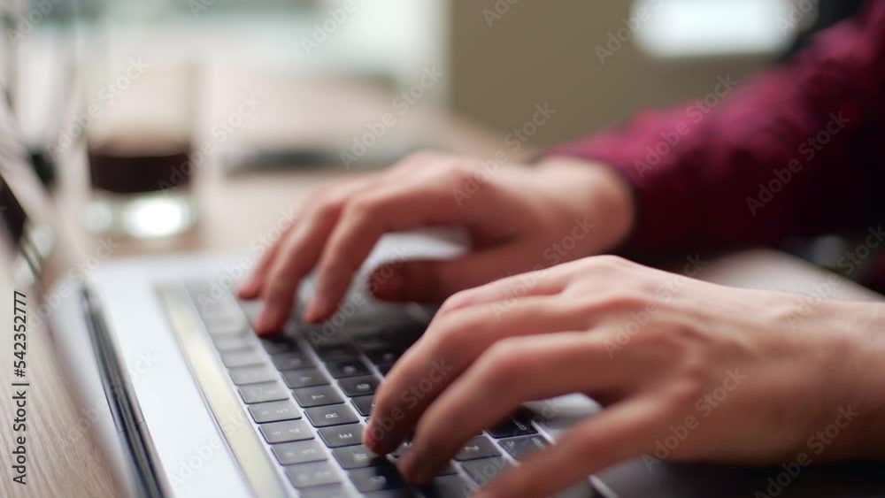 Wall mural close up of freelancer's developer hands typing program code on laptop keyboard in coworking. busine