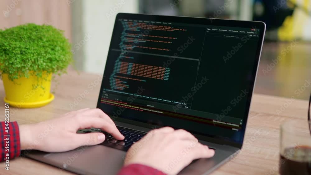 Canvas Prints close up of freelancer's hands typing code on laptop keyboard. camera slides around developer's fige