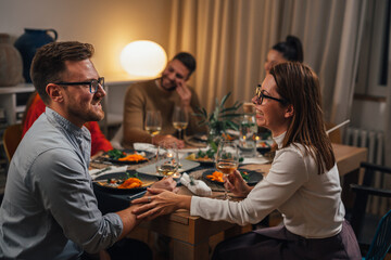 friends gathering on home dinner party