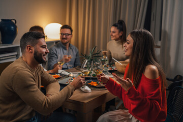 friends gathering for dinner party