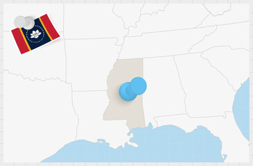 Map of Mississippi with a pinned blue pin. Pinned flag of Mississippi.