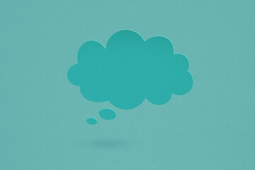 blank blue speech bubble grunge paper cut, on grunge blue paper background. Conceptual image about communication and social media
