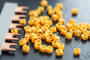 Cable markers scattered on the table, macro shot.