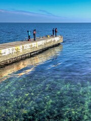 Fishermen on the pier in Odessa, Ukraine