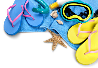 Beach accessories  isolated on white: snorkel and mask for diving, flip-flops, blue towel, starfish.