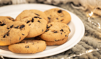 Cookies with chocolate chips close-up on a plate.