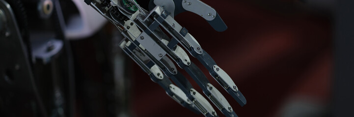 Dark metal robot arm. Technology and science concept