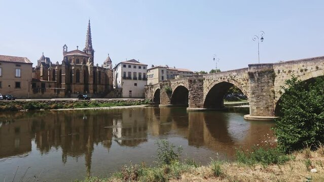 View of Saint-Martin church and Pont-neuf of Limoux from the opposite shore of Aude river. 