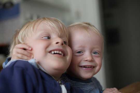 Two Happy Little Brothers At Home