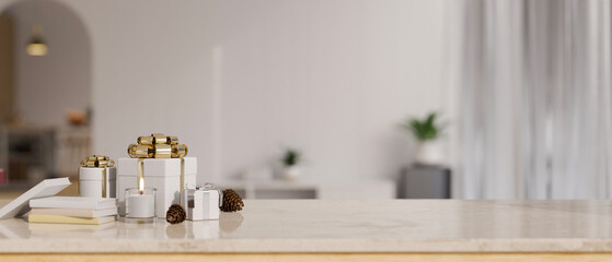 White marble tabletop with luxury gift boxes and copy space over blurred living room