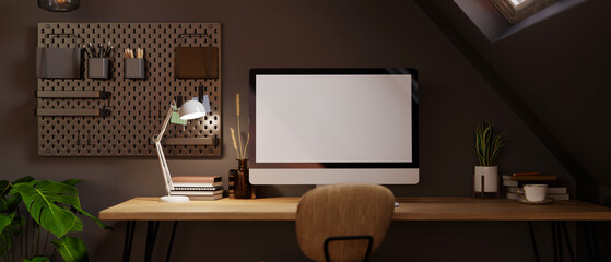 Modern dark home office workspace in attic room with computer mockup, black wall