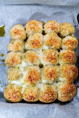pesto bread balls oven cheese pot white background