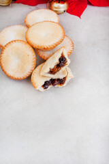 Christmas fruit mince pies on gray surface with lots of copy space