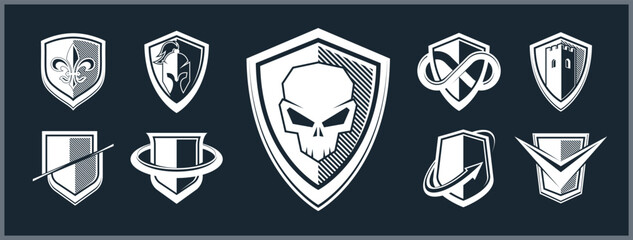 Classic shields shapes set with different additional elements vector symbols set, defense and safety icons, ammo emblems collection.