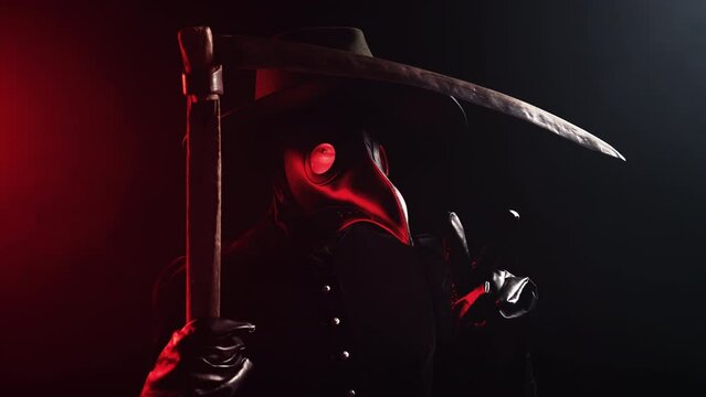 Plague doctor with sharp scythe showing peace sign or V on black smoke background. Creepy raven mask, halloween, historical terrible protection costume, mystical fantasy. Epidemic, death concept