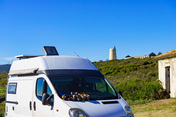 Caravan on spanish coast near lighthouse Carbonera