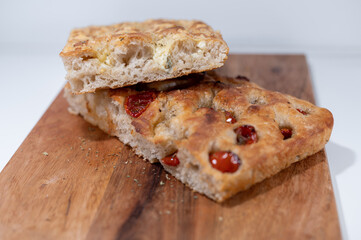 focaccia italian bread sun dried tomatoes cheese wood table