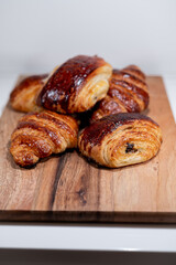 croissant, pain au chocolat bakery french dessert wood board 