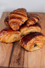 croissant, pain au chocolat bakery french dessert wood board 