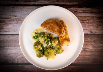 Recipe for homemade chicken fillet cordon bleu style with Brussels sprouts. High quality photo