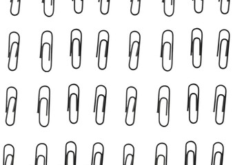 the black paper clips isolated on the white background