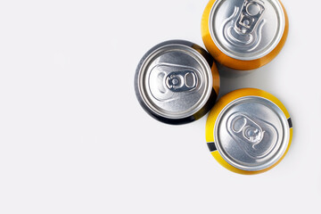 drinks in iron cans on white background, copy space