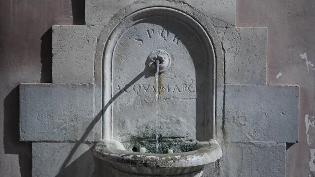 Antique Public Drinking Fountain In The Downtown Of Rome, Italy. Close up