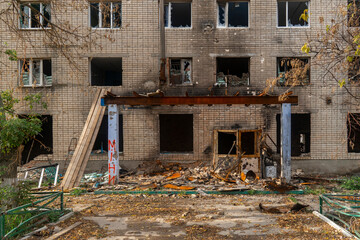 War in Ukraine. 2022 Russian invasion of Ukraine. Entrance of an apartment building destroyed by shelling. Terror of the civilian population. War crimes