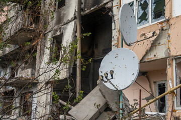 War in Ukraine. 2022 Russian invasion of Ukraine. An apartment building destroyed by shelling....