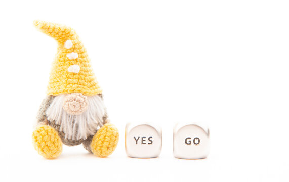 image of wool toy yes go cube white background