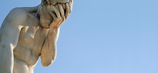 Facepalm - a statue with its head in its hand - obrazy, fototapety, plakaty
