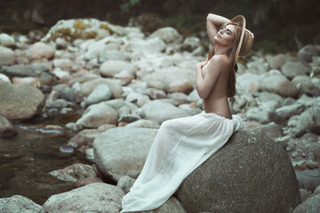 Summer portrait of beautiful young woman
