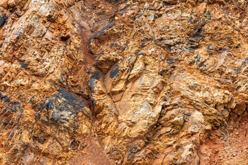 Photo texture of red stones with lichens and moss - photo background