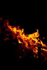 flames from a fire in the dark