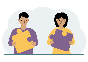 Fototapeta premium Team metaphor. People putting puzzle pieces together. The concept of teamwork and cooperation. Business concept.