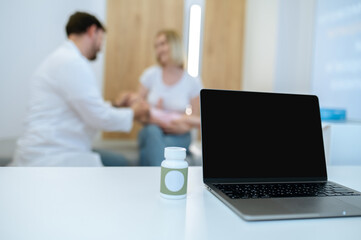 Male pediatrician examining a cute little baby