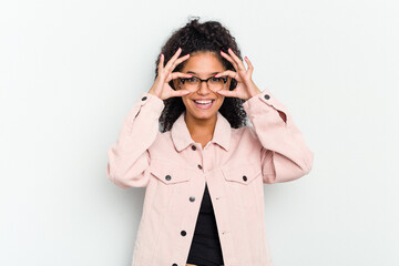 Young african american woman isolated excited keeping ok gesture on eye.