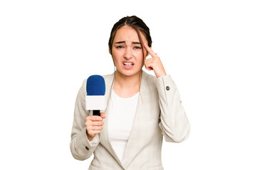 Young TV presenter caucasian woman isolated on green chroma background showing a disappointment gesture with forefinger.