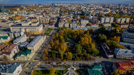A park in the midst of urban development. Kazan autumn cityscape. Aerial view of Kazan city center. 
