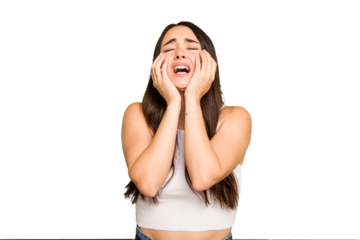 Young caucasian woman isolated on green chroma background whining and crying disconsolately.