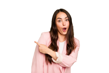 Young caucasian woman isolated on green chroma background smiling and pointing aside, showing something at blank space.