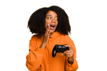 Young African American woman holding a game controller isolated is saying a secret hot braking news and looking aside