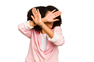 Young African American woman isolated keeping two arms crossed, denial concept.