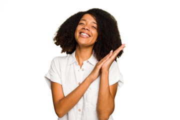 Young African American woman isolated feeling energetic and comfortable, rubbing hands confident.