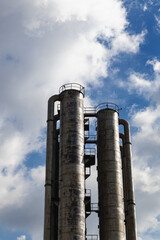 Low angle view of old rusty industrial chimney architecture