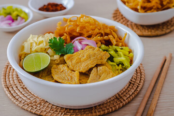 Thai curried noodle soup with pork (Khao Soi Moo), Northern thai food style.