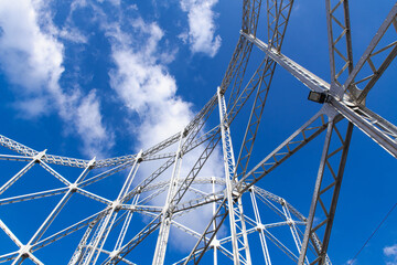 Industrial architecture steel silo metallic skeleton against sky