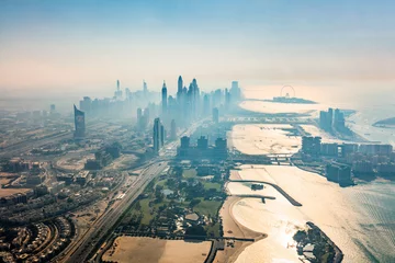 Fotobehang Dubai aerial view of marina skyscrapers and jumeirah beach at sunset © Photocreo Bednarek