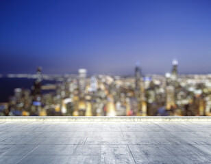 Empty concrete dirty rooftop on the background of a beautiful blurry Chicago city skyline at night, mockup